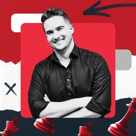 Max Miller, a smiling man with short hair folding his arms